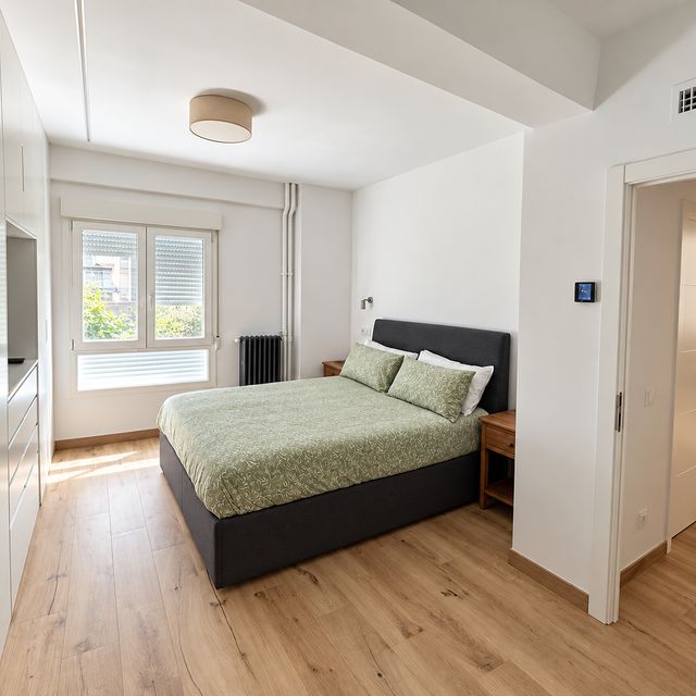 Dormitorio reformado por ADYAN